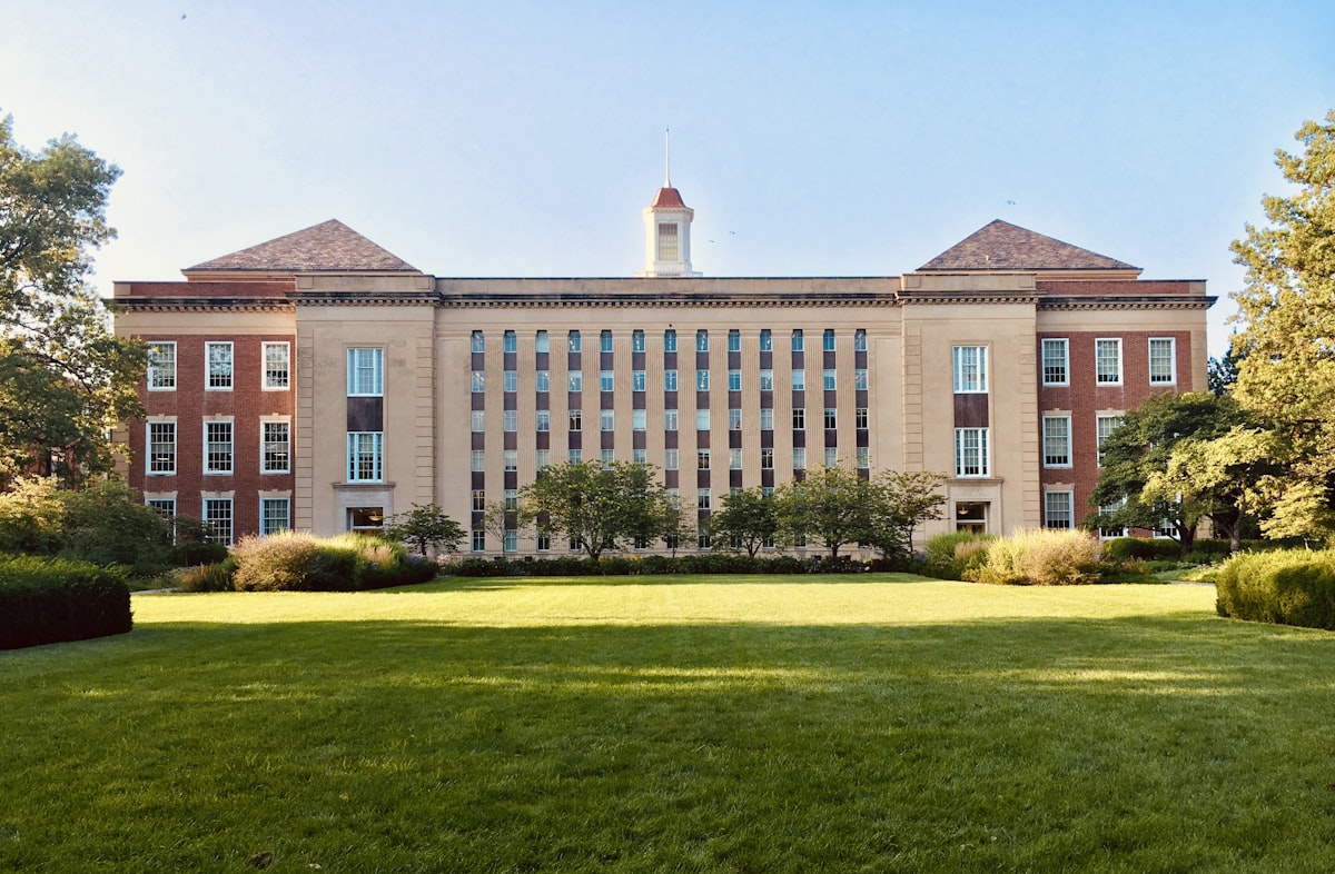 University campus with green lawns and academic buildings